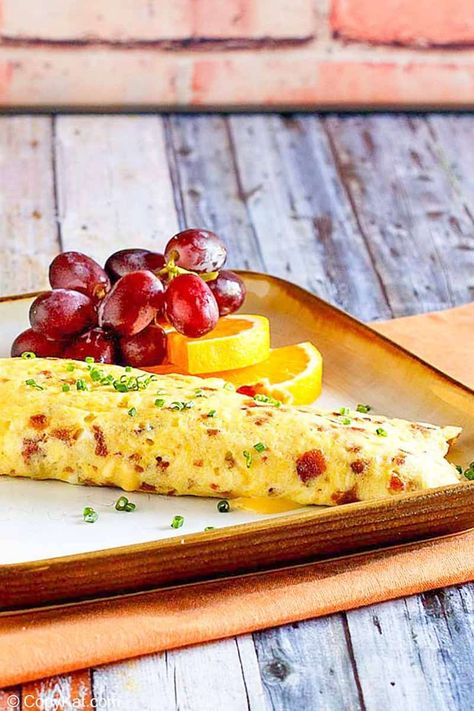 Learn how to make an IHOP Bacon Temptation Omelette with this easy copycat recipe. Get the secret to making it fluffy and delicious. Enjoy the best bacon and cheese omelet for breakfast or brunch. #omelet #omelettes #breakfastideas #howtocook #howtomake #eggs #brunchrecipes #baconrecipes #copycat #copycatrecipe Ihop Food, Runway Background, I Hop Pancake Recipe, Bacon Omelette, Cheese Omelet, Omelets Recipe, Bacon In The Oven, Omelette Recipe, Breakfast And Brunch