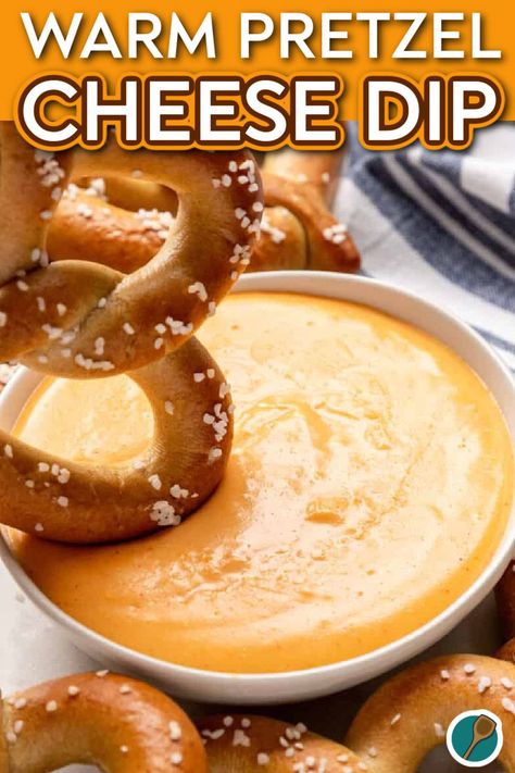 A warm, soft pretzel being dipped into a bowl of creamy cheese dip, topped with a sprinkle of salt. Sharp Cheddar Recipes, Pretzel Dips Easy, Pretzel Mustard Dip, Dip For Pretzels Easy, Warm Cheese Dip Recipes, Game Day Dips Football Season, Mustard Dip For Pretzels, Soft Pretzel Dip, Cheese Dip For Soft Pretzels