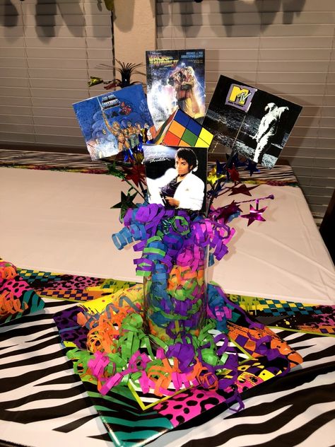 90s Birthday Party Theme Centerpieces, Dancing Through The Decades Centerpieces, Quiz Night Table Decorations, 80s Birthday Centerpieces, 90's Theme Centerpieces Party Ideas, Early 2000s Centerpieces, Dance Party Centerpieces, 1980s Party Centerpiece, 80s Theme Table Centerpieces