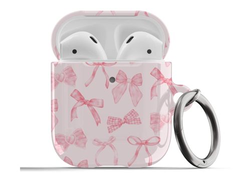 𝗗𝗘𝗦𝗖𝗥𝗜𝗣𝗧𝗜𝗢𝗡: Protect your AirPods with our Coquette Pink Bows AirPods Case! This cute AirPods case features cute pink bows on a light pink background. ∙ Impact absorbing & scratch resistant case  ∙ Wireless charging compatible ∙ Glossy or matte finish ∙ 3-piece design ∙ Materials: polycarbonate ∙ Slim and lightweight ∙ Precisely aligned port openings ∙ Includes a metal carabiner ∙ Printed in the USA ∙ 360o protection from bumps, drops, and scratches Important note: Our AirPods Pro Cas Preppy Airpod Case, Coquette Airpod Case, Air Pods Case Aesthetic, Airpod Cases Aesthetic, Pink Airpod Case, Aesthetic Airpods Case, Pink Airpods Case, Airpods Case Aesthetic, Cute Airpod Cases