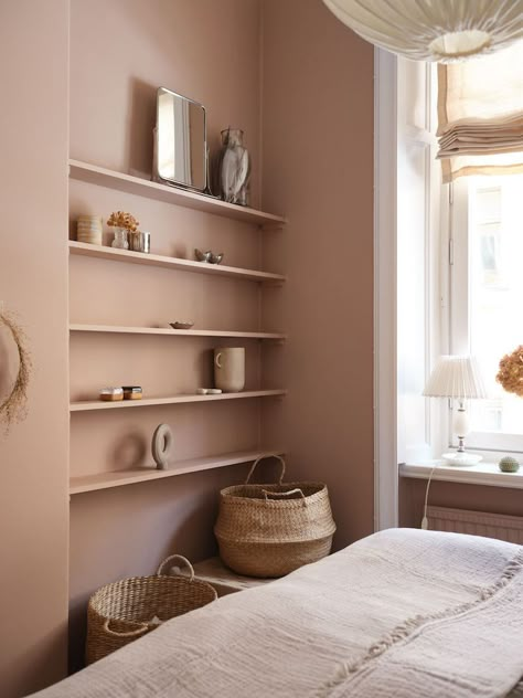 my scandinavian home: A Charming Stockholm Apartment with an Ochre Kitchen Color Drenching, Dusty Pink Bedroom, Yellow Kitchen Cabinets, Pink Bedroom Walls, Stockholm Apartment, Scandinavian Bedroom, Pink Bedrooms, Scandinavian Interior Design, Yellow Kitchen