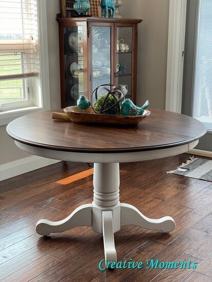 You know I love reloving dining tables and here is another one I intended to do for our home but after sharing the finished results it too was soon sold. I love old pedestal tables that go from round to oval. So when I saw this classic oak round pedestal table with leaf, yes please! After a good deep cleaning and repairs, The top of the dining table was lightly sanded with a sanding sponge and wiped well.To refresh the dark stained top I used the last of the discontinued… Dining Table Makeover Ideas, Farmhouse Dining Table Makeover, Diy Dining Table Makeover, Pedestal Kitchen Table, Refinished Table, Round Pedestal Table, Round Wooden Dining Table, Pedestal Tables, Dining Table Makeover