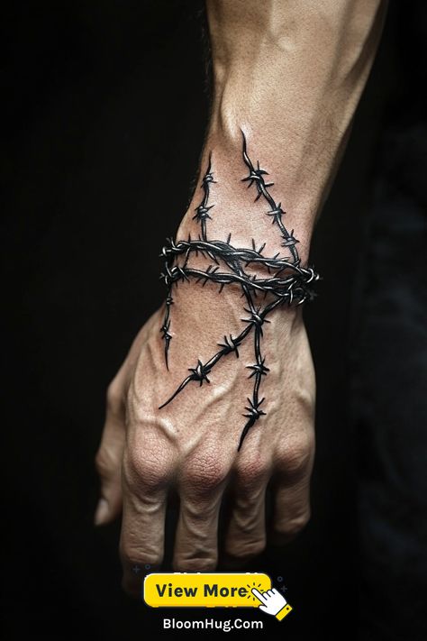 Barbed Wire Tattoo Ideas for Men with Rugged and Edgy Designs Millwright Tattoo, Barbwire Wrist Tattoo, Shoulder Trap Tattoos For Men, Wing Tattoos Men, Best Arm Sleeve Tattoos For Men, Railroad Tattoo Ideas, Cross Hand Tattoo Men, Broken Chain Tats, Tattoo For Biceps