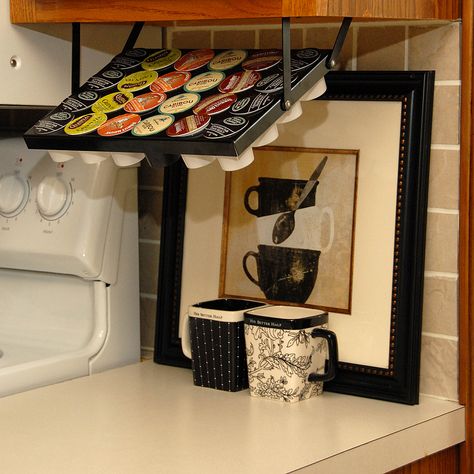 Do you own a Keurig and need a way to store all those K-Cups? Check out www.coffeekeepers.com Coffee Keepers are precision, all-steel K-Cup storage units that mount under cabinets and conveniently swing down for use. K Cup Storage, K Cup Holders, Clever Kitchen Storage, Kitchen Storage Hacks, Cup Storage, Kitchen Hacks Organization, Diy Holder, K Cups, Storage Hacks