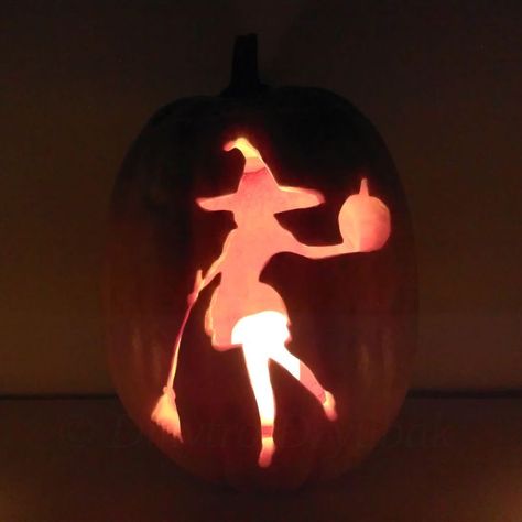 Witch with a Broomstick and a Pumpkin carved on the pumpkin. Pumpkin with candle inside in the dark. Witchy Jackolantern, Pumpkin Carving Ideas Witch, Witch Pumpkin Carving Ideas, Witchy Pumpkin Carving, Pumpkin Carving Witch, Witch Pumpkin Carving, Jack O Lantern Witch, Witch Jack O Lantern, Candle In The Dark