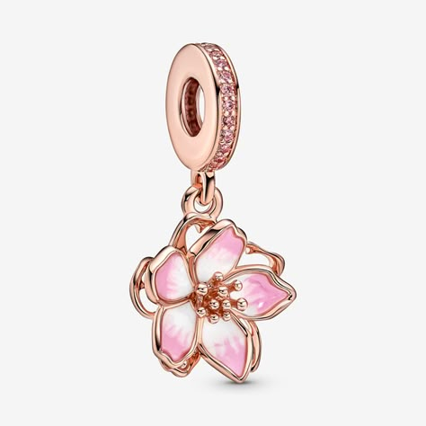 Celebrate the first signs of spring with our 14k rose gold-plated Cherry Blossom Dangle Charm. Featuring hand-applied sea pink and white enamel and accented by sparkling pink cubic zirconia, the petals on our cherry blossom rotate slightly, as if they were being blown in the breeze. A pavé-covered bail is the finishing touch on this must-have floral charm. Style it with other 14k rose gold-plated jewellery for a warm spring look. - Pandora Cherry Blossom Dangle Charm - Enamel / 14k Rose gold-pla Pandora Travel Charms, Rose Gold Pandora, Pandora Travel, First Signs Of Spring, Pandora Jewelry Charms, Signs Of Spring, Charms Pandora, Travel Charms, Jewelry Accessories Ideas