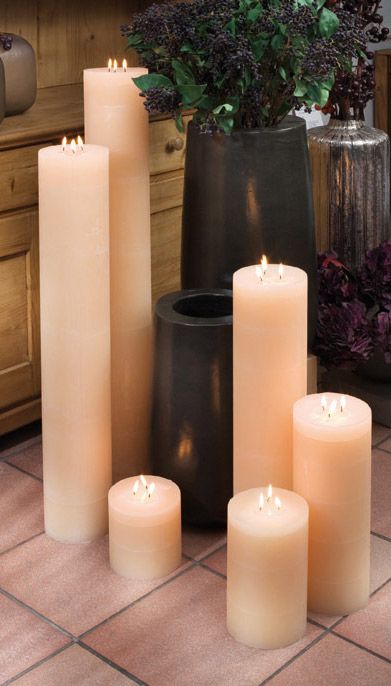 Those giant candles light up your room.Their  important lifetime is perfect for long winter nights. Giant Floor Candles, Large Floor Candles, Giant Candles Decor, Huge Candles Decor, Candle Techniques, Big Candles Decor, Big Candles Decor Living Rooms, Pillar Candles Fireplace, Floor Candles