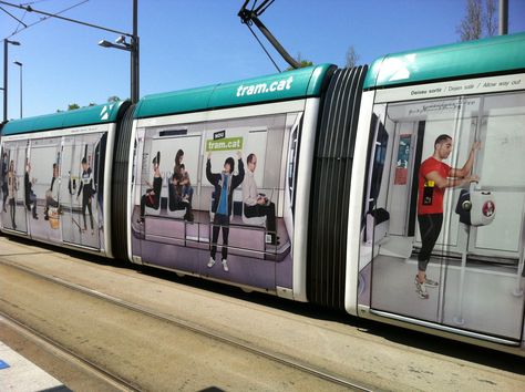 wrap Tram advertising tram - Barcelona Train Wrap Advertising, Train Branding, Transit Advertising, Car Branding, Vehicle Graphics, Street Marketing, Unique House Design, Guerilla Marketing, Light Rail