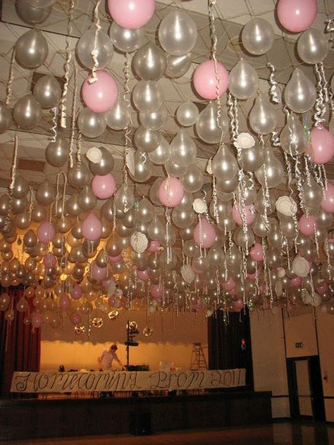 doilies, ribbon, balloons loooots of work CC: It looks like they hung some kind of netting from the ceiling. (?) Not sure if we could pull this off, but I like the effect. Maybe clusters of balloons on the floor would work. 21st Birthday Hall Decorations, 18th Birthday Hall Decorations, Prom Hall Decoration, Balloons Hanging From Ceiling Birthday, Hall Party Decorations, Hall Party Ideas, Balloon Hanging From Ceiling, Party Hall Decor Ideas, Hall Decoration Ideas Party