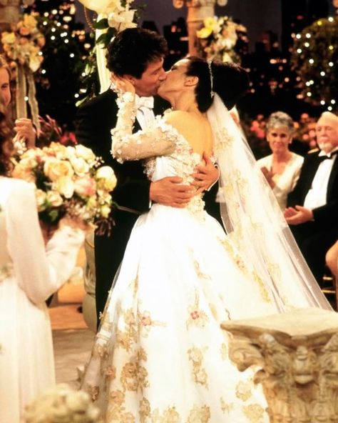 The jaw-dropping dress Fran Fine (Fran Drescher) wore for her walk down the aisle to marry Maxwell (Charles Shaughnessy) was a cream-colored satin gown covered in aurora borealis rhinestone studs from Celeste in Beverly Hills. "Ultimately we came up with the concept that we wanted the gown to look like every viewer's most romantic fantasy, something that would put, you know, [Princess] Diana's wedding dress to shame and every other great wedding gown since," Drescher said. Nanny Show, Die Nanny, Movie Wedding Dresses, Nanny Outfit, Diana Wedding Dress, Tv Weddings, Princess Diana Wedding, Fran Drescher, Diana Wedding