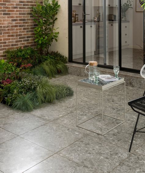 Spaces™ Adelfia Outdoor Flint 40mm Tile Outdoor Terrazzo, Terrazo Flooring, Brown Terrazzo, Crystal Glaze, Outdoor Porcelain Tile, Indoor Outdoor Fireplaces, Tile Adhesive, Topps Tiles, Garden Tiles