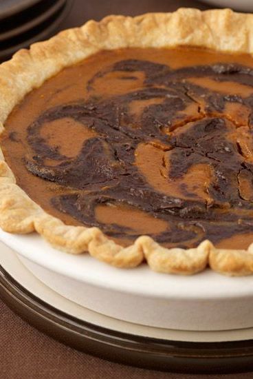 This pumpkin pie, made with all-butter pie dough, includes swirls of filling mixed with melted bittersweet chocolate for even more flavor. Chocolate Pumpkin Pie, Pear Pie, Pie Thanksgiving, Thanksgiving Pumpkin Pie, Pumpkin Pie Recipe, Chocolate Swirl, Chocolate Pie, Recipes Thanksgiving, Thanksgiving Pumpkin