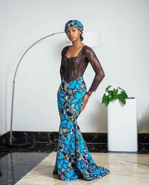 Enhance your style with this exquisite African Print And Lace Corset Mermaid Dress.  Embrace elegance and culture in this stunning piece - perfect for any formal event. Step into sophistication with this unique Black Pencil Dress and make a statement that's bound to turn heads.  Experience the beauty of a Long Ankara Dress with a modern twist - shop now and stand out from the crowd! Chilanga Mulilo Dresses For Guests, Fitted Fishtail Maxi Dress For Wedding, Fitted Lace Blue Gown, Fitted Blue Lace Gown, Blue Fitted Lace Gown, Wedding Fishtail Lace Dress, Ankara Corset Dress, Chilanga Mulilo, Long Ankara Dresses