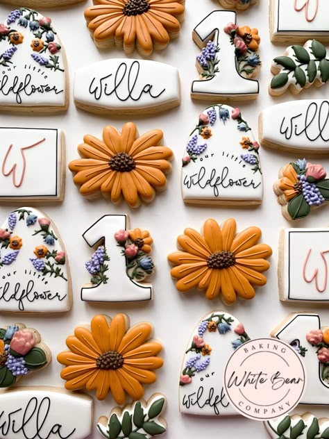 Our little wildflower cookies Flower First Birthday Cookies, One Year Old Flower Birthday Party, Wildflower Second Birthday Party, Wildflower Tattoo With Name, Wildflower Bday Party, Wildflower One Birthday Party, Wildflower 1st Birthday Party Theme, Wildflower Cookies First Birthday, Wildflower 1st Birthday Cookies