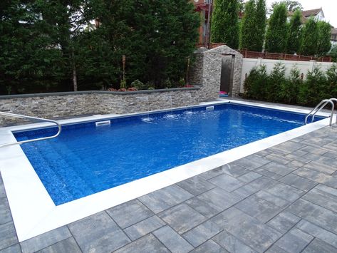 14x28 Vinyl with "Stadium" entry steps with Save-T Auto Cover (vanishing edge brackets) and 3 Sheer Descent Waterfalls.  Call us today at (718) 746 – 5005 for a free consultation. We service all of Queens, Long Island, Manhattan, and Westchester (New York). Inground Pool With Diving Board, 14x28 Inground Pool, Inground Pool Tanning Ledge, Latham Pool Liners Inground, Island Granite Pool Liner, 20x40 Pool With Tanning Ledge, Pool Stairs, Entry Steps, Swimming Pool Service