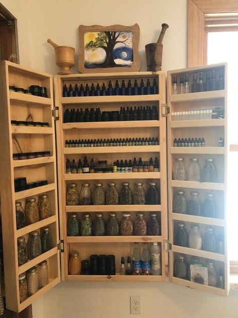 Hanging Apothecary Cabinet, Herbal Medicine Cabinet Aesthetic, Herbalist Home Decor, Herbalist Medicine Cabinet, Portable Apothecary Cabinet, Dried Herb Storage Ideas, Herbal Storage Apothecary Cabinet, Herb Cabinet Diy, Home Apothecary Cabinet