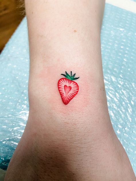 Strawberry heaet tattoo Color Strawberry Tattoo, Heart Strawberry Tattoo, Strawberry Tattoo Simple, Strawberry Fields Tattoo, Strawberry Heart Tattoo, Small Strawberry Tattoo, Cute Strawberry Tattoo, Strawberry Tattoo Minimalist, Strawberry Tattoos