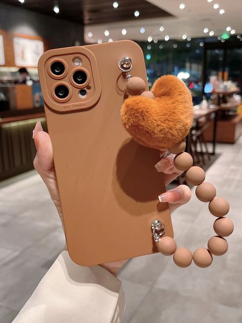 Free Returns ✓ Free Shipping✓. Plain Phone Case With Fluffy Heart Decor Handstrap- Phone Cases at SHEIN. Brown Phone Case, Girly Phone Cases, Heart Decor, Pretty Iphone Cases, Blush Nails, Apple Phone Case, Stylish Phone Case, Girly Accessories, Case Phone