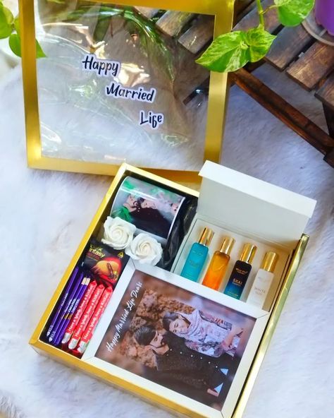 Customised wedding gift hamper❤️ A5 photo frame Photo mug Perfume Set Chocolates & Decors Wishcard DM for Orders @crafting_with_zana #weddinggift #weddinggiftideas #weddinggifts #weddinggiftbox #weddinggifthamper #weddinggifting #groomgiftideas #bridegiftideas #bridesmadegifts #bridesmadegiftideas #bridetobegiftideas #groomtobegiftideas #weddingseasongifting #customisedgiftbox #customisedgifts #customisedgifthampers #sassysquare #spreadinghappiness Wedding Gift Hampers, Photo Frame Images, Personalised Gifts Diy, Bridal Gift Wrapping Ideas, Happy Married Life, Customised Gifts, Photo Mug, Perfume Set, Wedding Gift Boxes