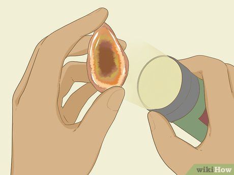 How to Identify Agate: 7 Steps (with Pictures) - wikiHow Rock Identification Pictures, How To Identify Rocks, Rock Identification, Agate Rocks, Hammer And Chisel, Lake Superior Agates, Rock Types, Chalcedony Stone, Rocks And Gems