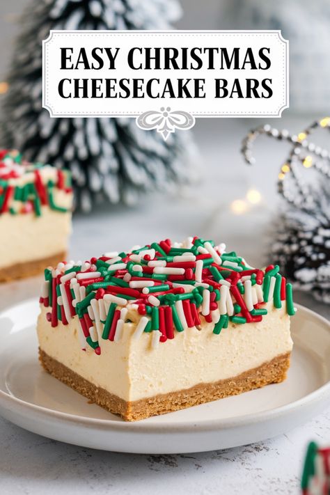 Festive cheesecake bar with red, green, and white sprinkles on a plate, with a snowy pine tree backdrop. Pillsbury Cheesecake Bars, Philadelphia Cheesecake Bars Recipes, Christmas Cookie Cheesecake Bars, Easy Holiday Bars, Holiday No Bake Cheesecake, Sheet Pan Cheesecake Bars, Christmas Cheesecake Bars Recipes, Gathering Dessert Ideas, Crescent Cheesecake Bars