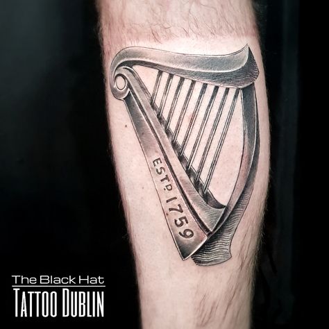 There is no luck to being one of the best tattoo studios in Dublin, it’s the clever mix of the right skills and values that have brought us to the first place in our customers list. . @blackhatsergy @theblackhattattoodublin  . #realismtattoo #realistictattoo #guiness #guinessharp #harptattoo #guinesstattoo #irishharp #irishtattoo #irishtattooartist #ink #dublin #tattoodublin #inked #bestrealistictattoos Irish Harp Tattoo, Celtic Tattoo Meaning, Tattoo Dublin, Celtic Tattoo Designs, Hat Tattoo, Shamrock Tattoos, Dragon Tattoos For Men, P Tattoo, Irish Tattoos