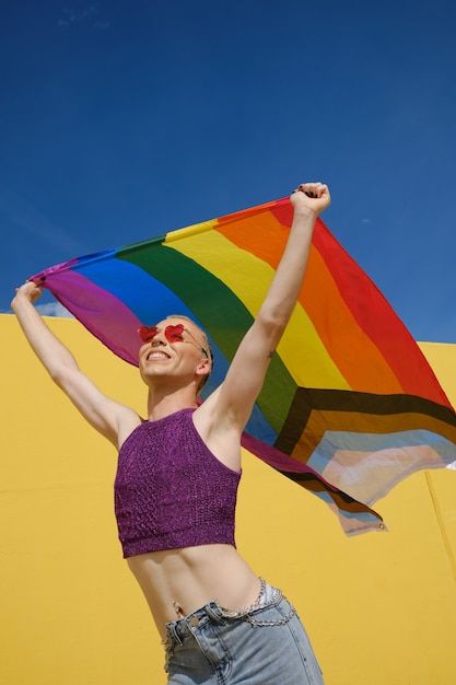 Person Holding Pride Flag, Flag Pose Reference, Person Holding Flag, Pride Colors, Low Angle, Non Binary, Rainbow Flag, Equal Rights, Gender Identity