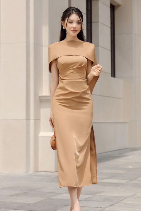 #FashionInspiration #StyleGoals #TrendyLooks #FashionistaFaves #OOTD #FashionForward #InstaFashion #FashionAddict #FashionObsessed #FashionGoals Light Brown Dress Formal, Modest Outfits Dresses, Light Brown Dress, Brown Dresses Formal, Formal Midi Dress, Clothing Pattern Design, Bridesmaid Satin, Kebaya Muslim, Gowns Dresses Elegant