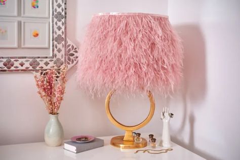 Here's How to Turn an Old, Worn, or Plain Lampshade into a Boho Beautiful Design | Apartment Therapy Ostrich Feather Lamp, Feather Lampshade, Pink Lampshades, Pink Ostrich Feathers, Lamp Redo, Feather Lamp, Lampshade Makeover, Boho Beautiful, Parisian Vibes