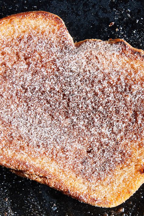 NYT Cooking: The ingredients for cinnamon toast — bread, cinnamon, sugar and butter — have remained largely unchanged since the recipe first appeared in 15th century Europe, where it was introduced as a less expensive version of French toast. Some variations call for adding the cinnamon and sugar before toasting, others after. The secret to achieving a cinnamon toast that’s both gooey and crunchy? A combina... New York Times Cinnamon Toast, Cinnamon Toast Recipe, Nyt Recipes, Tomato Bake, Roasted Fish, Bread Cinnamon, Orzo Recipe, Coconut Fish, Sugar Sticks