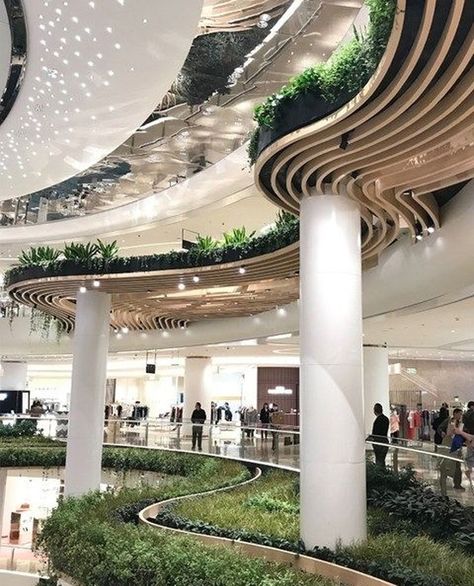 Galeries Lafayette Shanghai is known worldwide for its eye-catching integration of biophilic design into commercial space. Each floor is lined with deep planted beds mimicking meadows as they wind their way around the retail units. Simply put this is not your average shopping centre   via @pinterest . . . . . . . #plantdesigns #galerieslafayette #biophilia #biophilicdesign #architecture #architectureporn #natureatwork  #architecturelovers #architecturephotography #archilovers #archilover #arquit Mos Wand, Shopping Mall Interior, Shopping Mall Design, Shenyang, Mall Design, Modern Office Design, Ceiling Ideas, Green Architecture, Retail Interior