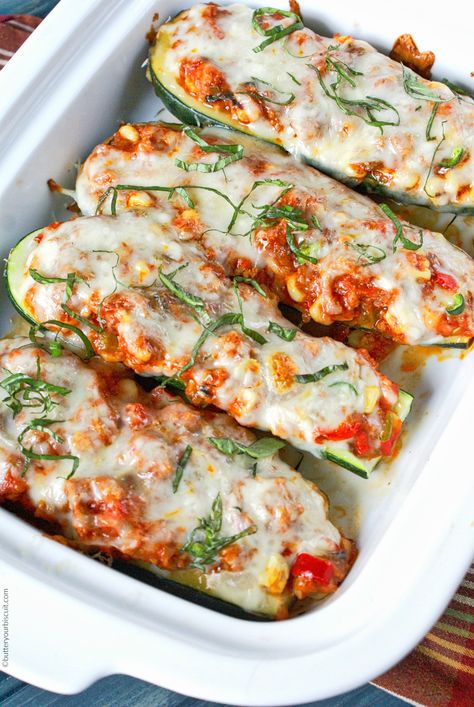 Summer wouldn't be the same without these hollowed out zucchini boats filled with sausage, peppers and cheese. A great way to use up all the extra zucchini. Chicken Parmesan Zucchini Boats, Zucchini Boat Recipes, High Protein Dinner, Protein Dinner, Ground Chicken Recipes, Stuffed Zucchini, Chicken Zucchini, Zucchini Boats, Parmesan Zucchini