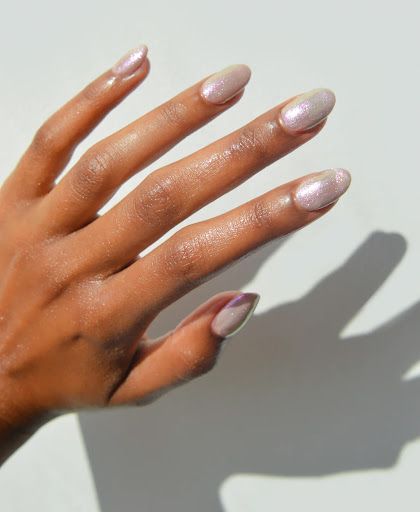 These 8 Spring Nail Trends Are About to Be Everywhere (2023) | The Quality Edit Sparkle Overlay, Iridescent Nail Polish, Shimmer Nail Polish, La Nails, Spring Nail Trends, Cuticle Care, Nail Shimmer, Isopropyl Alcohol, Pedicure Kit