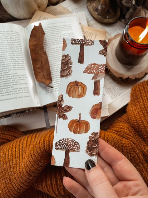 Hand drawn elements on autumn painted onto a luxurious paper. Perfect for a cosy evening of reading. Double sided. My Fall Aesthetic, Autumn Handmade Decoration, Paint A Bookmark, Bookmark Photography, Autumn Aesthetic Gilmore, Autumn Crafts For Adults, Autumn Diys, Aesthetic Background Green, Autumnal Art