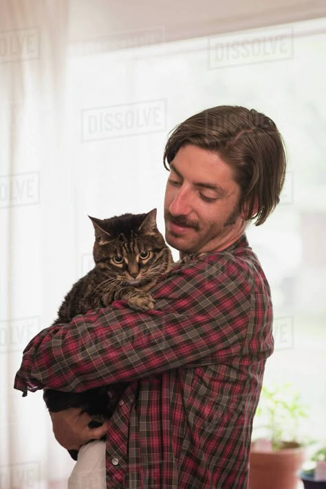 Man holding cat stock image Holding An Animal Pose Reference, Holding Animal Pose, Staring Pose Reference, Holding Dog Pose Drawing, Holding Animal Drawing Reference, Person Holding Dog Reference, Hold Cat Pose, Person Holding Stuffed Animal Reference, Holding Cats Reference