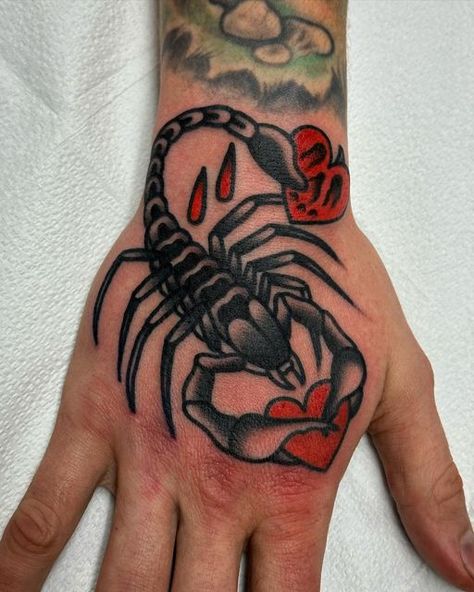 Jordan Allen on Instagram: "Scorpion done on the hand of one of the best! Thank you @toddclarktattoos for the trust. You're the man! #traditionaltattoo #tattoo" American Traditional Sleeve Color, Scorpion American Traditional Tattoo, Trad Scorpion Tattoo, Hand Tattoos American Traditional, Scorpion Tattoo Hand, Traditional Tattoo Scorpion, Scorpion Tattoo Flash, Hand Tattoos Traditional, Scorpion Tattoo Traditional