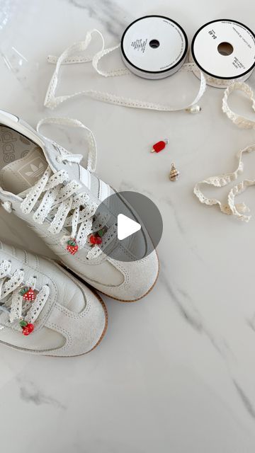 Aurelie Erikson on Instagram: "Sneaker lovers, this is your sign to switch out your laces for ribbons and charms! 🍒🎀🍓
While walking the streets of NYC last week, I spotted several girlies wearing the cutest kicks with ribbon laces and adorable charms; I couldn’t wait to try it myself! 👟🤩

Just add a small 🧷 to the end of the ribbon.

save & share with a sneaker lovin friend 🫶🏼

.
.
.
.
.
.
.
#sneakerheads #sneakeraddict #adidas #ribbon #diycrafts #fashioninspo #summerfashion #trending #diytutorial #shoeaddict #sneakerfiles #hobbylobbyfinds #viraltrend" Ribbon As Shoe Laces, Ribbon Laces Sneakers, Aurelie Erikson, Wearable Crafts, Ribbon Laces, Sneaker Lovers, Lace Sneakers, Sneakers Addict, Diy Ribbon