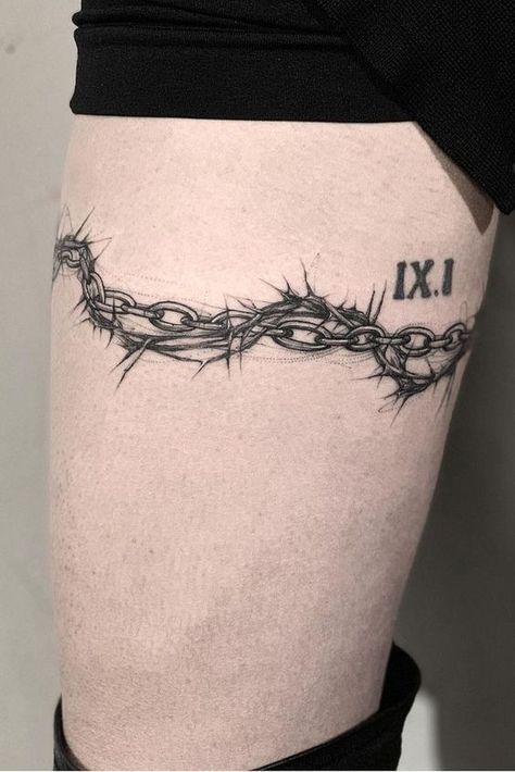 Learn the surprising barbed wire tattoo meaning before you get it on a body. As a bonus, we've added more than 60 unusual ideas for inspiration. Motorcycle Chain Tattoo, Bike Chain Tattoo, Heart Chain Tattoo, Ball And Chain Tattoo, Tattoo Bicycle, Tattoo Chain, Tattoo Motorcycle, Daisy Chain Tattoo, Tattoo Bike