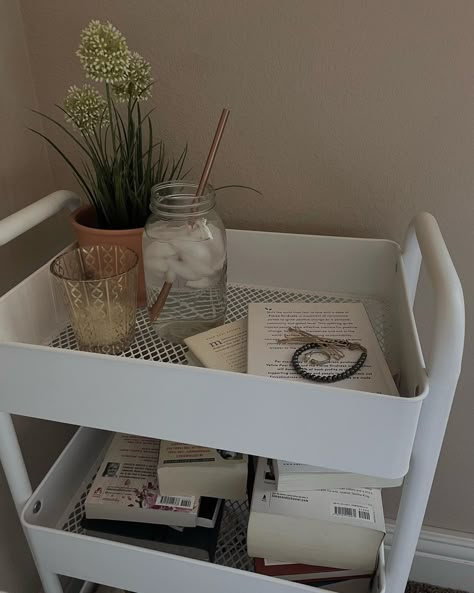 Book Bedside Table Aesthetic, Bedside Table Books Aesthetic, Book Cart Nightstand, Rolling Cart Bedside Table, Rolling Book Cart, Book Cart Idea Aesthetic, Snack Cart Aesthetic, Ikea Book Cart, Ikea Cart Aesthetic