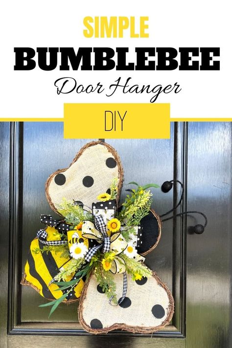 This simple bumblebee door hanger will add rustic charm to your front door. From the grapevine wreath around the outside to the burlap fabric and whimsical ribbons, this is a can’t miss. Learn how to create this easy for beginners perfect for summer door hanger. Follow this tutorial and you’ll be able to make one just like it. Fabric Door Hangers, Wreath Making Business, Summer Door Decor, Burlap Door Hanger, Honey Bee Decor, Burlap Door Hangers, Door Hangers Diy, Summer Door Hanger, Bee Wreath