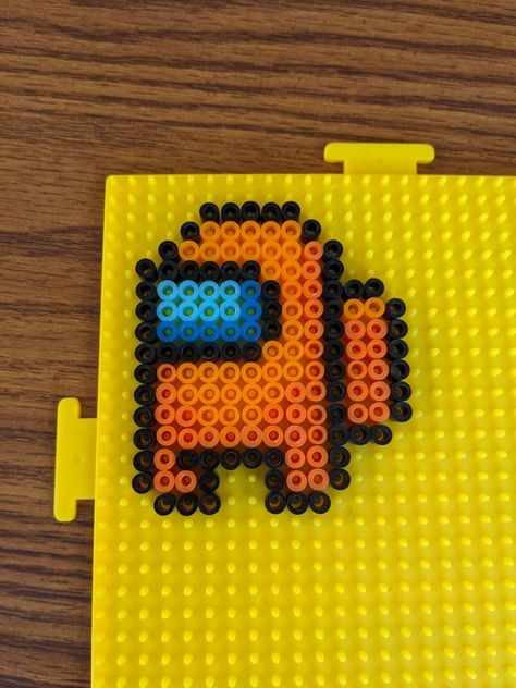 Orange Among Us perler bead pattern craft Among Us Peeler Beads, Perler Bead Patterns Among Us, Among Us Perler Bead Pattern, Orange Perler Bead Patterns, Roblox Perler Beads, Perler Bead Among Us, Among Us Crafts, Among Us Perler Beads, Perler Bead Ideas