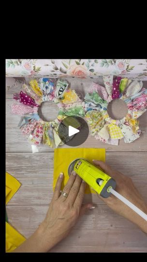 Mason Jar Flowers - Slower Instruction Video:) | By Knot Just Chalk | I had somebody ask me if I
would do a slower video on how I made the mason jar flowers.
So here you go. I cut or tore. I tore. You can cut them if you
prefer. But I cut twenty different pieces of fabric. Now
you can do any color you want. You can do a sunflower and do
all yellow. Whatever you want. I chose 20 different fabrics.
And they're eight inches long and they're about three
quarters of an inch wide. And so what you do is you take it
and you fold it in half. You put it through the lid and then
you pull the tails through the loop on the other side. So
you're creating a knot. So you just fold it in half, put it
through the lid, and pull the tails through the loop. And
depends on what size mason jar you use what size Jar Lid Flowers, Jar Rings Crafts, Canning Lid Flowers, Canning Jar Lid Flowers, Jar Ring Sunflowers, Mason Jar Fabric Toppers, Mason Jar Lid Flowers, Mason Jar Lid Fabric Flowers, Canning Jar Lid Sunflowers