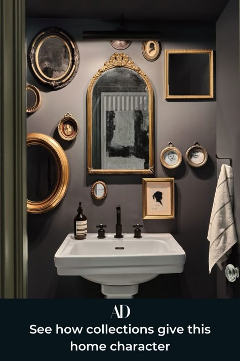 Tour this modern yet classic brownstone in Brooklyn, New York, and get inspired by the gallery walls, restored fireplaces, textured decor, and calming palette.  #mirror #frames #framing #gallerywall #gallery #powderroom #pedestalsink #linens #mauve #paint #dramatic #vanity #fixtures #brass #porcelain #guest #hosting #guestroom #guestbathroom #collecting #display #NYC Mirror Gallery, Mirror Gallery Wall, Brooklyn Brownstone, Dark Home Decor, Powder Room Design, Dark Home, Oval Mirror, Black Bathroom, A Mirror