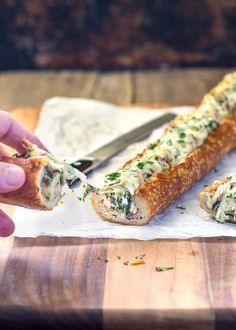 This easy, cheesy, creamy feta and spinach stuffed french bread is deliriously rich and tasty. It reminds me of a Greek spanakopita but all stuffed inside a wonderful sourdough bread loaf. Perfect hand held appetizer for parties or the holidays! www.keviniscooking.com Sourdough Bread Loaf, Stuffed French Bread, Greek Spanakopita, Creamy Feta, French Bread Recipe, Bread Loaf, Buffalo Chicken Dip, Easy Cheesy, French Bread