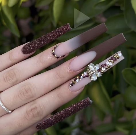 Simple Long Nails Ideas Brown, Fall Long Coffin Acrylic Nails, Chocolate Acrylic Nails Coffin, Fall Sets Acrylic Nails, Brown And Purple Nails Acrylic, Brown Nails With Gold Rhinestones, Brown Acrylics With Rhinestones, Brown Nails Bling, Xl Long Acrylic Nails Brown