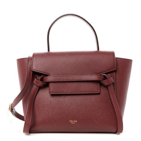 This is an authentic CELINE Grained Calfskin Nano Belt Bag in Light Burgundy.This chic handbag is crafted of rich grained calfskin leather in burgundy with a structured and spacious silhouette. This shoulder bag features a leather top handle strap, an optional shoulder strap and polished aged brass clasps. The facing flap opens to a matching suede interior with room for your daily essentials, with the classic style of Celine! Light Burgundy, Celine Bag, Bag Light, Chic Handbags, Aged Brass, Daily Essentials, Leather Top, Belt Bag, Top Handle