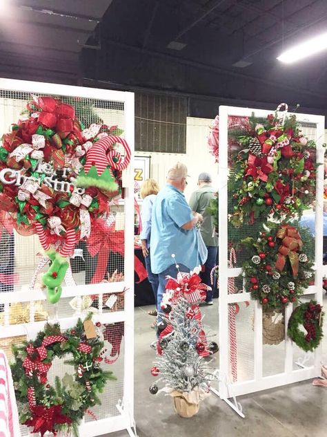 Wreaths are a great way to add some festive flair to your home. But what if you're hosting a craft show? This quick guide will give you my top wreath display ideas, plus tips for drawing in buyers at the craft fair! Wreath Display For Craft Show, Display For Craft Show, Selling At Craft Fairs, Wreath Display, Vendor Booth Display, Craft Fair Booth Display, Christmas Booth, Craft Show Booths, Craft Show Booth