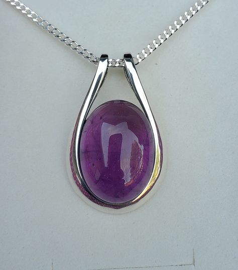 Gorgeous Natural Amethyst Necklace, 13x18mm Smooth Cabochon, See Video For Example Of Available Gems! You Can Ask to See Pendant Before Mailing. Being A Natural Stone, There Are Minor Variations That Do Not Affect Integrity. Sleek 925 Sterling Silver Pendant, Bezel Style, Incorporated Bail, Rhodium Plated, 20" Sterling Silver Chain (Chain Length Options Available By Messaging Seller For Availability At Time Of Purchase). Gift Box Included. *More Will Be Coming Soon! Big Gem Necklace, Gemstone Pendant Design, Amethyst Jewelry Necklace, Pendant With Stone, Gem Stone Necklace, Necklace With Stone, Jewelry Knowledge, Wire Wrap Jewelry Designs, Mens Necklace Pendant