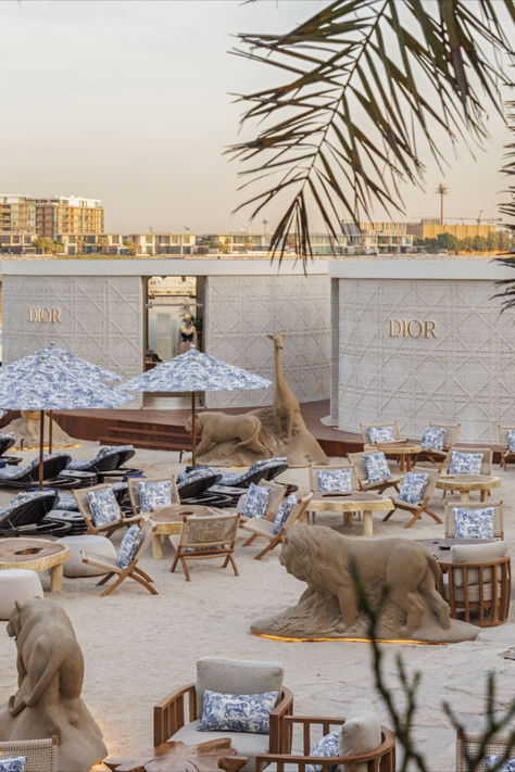 See elegance unveiled in the heart of Dubai, where the Dior Cruise 2024 collection by Maria Grazia Chiuri is featured alongside the House's timeless toile de Jouy with exclusive, iconic pieces at the newly opened Dior Nammos Pop-Up. © Kristen Pelou Dior Nammos Dubai, Dior Beach Club, Dior Pop Up, Indigenous Costume, Dior Dubai, Dior Cruise 2024, Arnault Family, Brand Pictures, Bat Yam