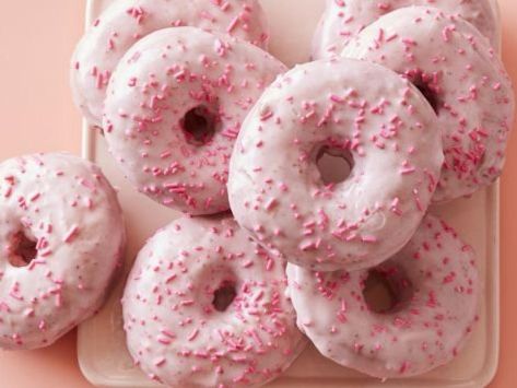 Pink Strawberry Doughnuts Recipe | Food Network Strawberry Doughnut Recipe, Strawberry Doughnut, Strawberry Glaze, Freeze Dried Raspberries, Pink Vanilla, Sugar Pie, Dried Raspberries, Cute Donuts, Doughnut Recipe